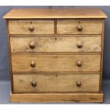 VICTORIAN MAHOGANY CHEST of two short over three long drawers with turned wooden knobs on a plinth