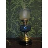THIS LOT IS PART OF THE CONSIGNMENT FROM BODELWYDDAN CASTLE A BLACK & BRASS BASED ELECTRIFIED OIL