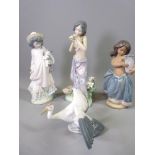 FOUR LLADRO PORCELAIN FIGURINES to include Landing Crane No 1600, Aroma of The Islands No 1480,