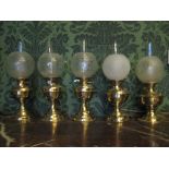 THIS LOT IS PART OF THE CONSIGNMENT FROM BODELWYDDAN CASTLE FIVE CIRCULAR BASED BRASS OIL LAMPS,