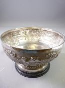 INDIAN STERLING SILVER PEDESTAL BOWL on ebonized circular stand, 10cms H overall, 17cms diameter