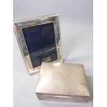 PRESENTATION SILVER CIGARETTE BOX and a modern Carrs sterling silver photograph frame, Birmingham