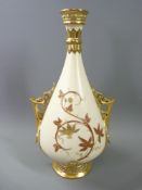 ROYAL WORCESTER BLUSH NARROW NECKED TWIN-HANDLED VASE of tapered form with a pair of ring and