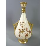 ROYAL WORCESTER BLUSH NARROW NECKED TWIN-HANDLED VASE of tapered form with a pair of ring and