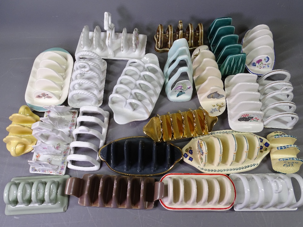 STAFFORDSHIRE TOAST RACKS, a good assortment including Carltonware, Sadler, Wedgwood and many more