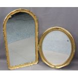 GILT FRAMED WALL MIRRORS (2) including an oval example with bevel edged glass, 60 x 48.5cms with