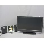 SONY FLATSCREEN TV and a Phillips CD player with speakers E/T