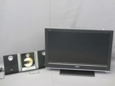 SONY FLATSCREEN TV and a Phillips CD player with speakers E/T