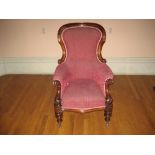 GENTLEMAN'S VICTORIAN MAHOGANY SPOONBACK ARMCHAIR with scrolled back and arm supports, turned