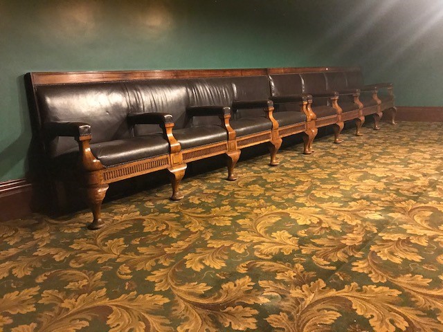 EXCELLENT PAIR OF WALNUT FOUR SEAT CLUB BENCHES with button edged leather effect upholstery having