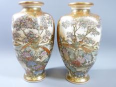 SATSUMA VASES, A PAIR, extravagantly decorated with lakes, flowers and exotic birds, of baluster