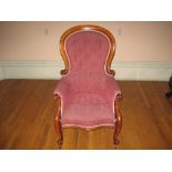 LADY'S MAHOGANY SPOONBACK VICTORIAN ARMCHAIR curved scrolled back and buttoned upholstery, with