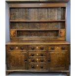 ANGLESEY NORTH WALES OAK DRESSER circa 1840, the three shelf rack with wide boarded back and lower