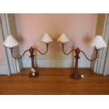 REPRODUCTION SCUMBLED METAL TWIN BRANCH LAMPS in the form of vintage wig stands with white glass