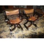 CONTINENTAL CARVED & STAINED WALNUT X FRAME CAMPAIGN TYPE FOLDING CHAIRS with leather seats and