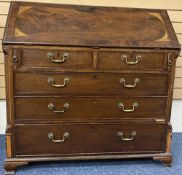 GEORGIAN MAHOGANY FALL FRONT BUREAU, the cross banded fall with inlaid spandrels opening to reveal a