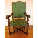 CONTINENTAL ANTIQUE WALNUT ARMCHAIR, carved Carolean style with swept and knurled arms and shaped