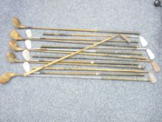 OLD GOLF CLUBS - a large parcel of wooden and sudo wood shafted golf irons and woods