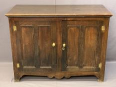 ANTIQUE OAK TWO DOOR SIDEBOARD having brass hinges and door furniture, oak interior shelves on