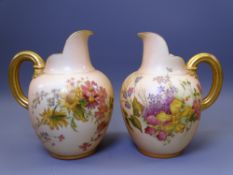 ROYAL WORCESTER BLUSH FLORAL CHINA - a pair of medium flatback jugs with gilt handles, Reg Nos 29115