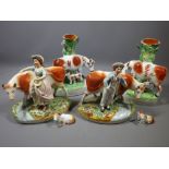 STAFFORDSHIRE POTTERY COW FIGURINES, 6 pieces including a pair of cow and calf spill holders,