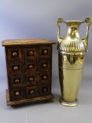 AN APPRENTICE STYLE CHEST OF 12 DRAWERS, 30cms H, 24cms W, 17cms D and a WMF twin-handled brass