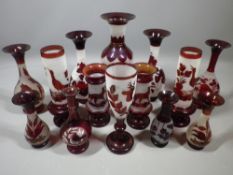 ETCHED RUBY RED VASES, a collection of 14