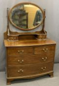 CIRCA 1900 MIRRORED BOW FRONTED DRESSING CHEST of two short over two long drawers and twin drawers