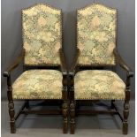 VINTAGE OAK COTTAGE STYLE ARMCHAIRS having animal adorned tapestry covers to the seats and backs,