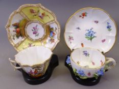 MEISEN - two cup and saucer sets, one with floral relief decoration, both on stands