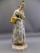 JEAN GILLE PARIS PORCELAIN FIGURINE of a demure Spanish girl with basket, 51.5cms H, underglaze mark