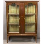 EDWARDIAN MAHOGANY TWO DOOR CHINA DISPLAY CABINET with boxwood and ribbon swag applied detail,