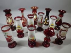 RUBY RED GLASS ETCHED & PAINTED VASES, a collection of 13