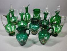 EDELWEISS ENAMEL & GILT DECORATED VICTORIAN GREEN GLASS JUGS & DECANTERS WITH STOPPERS, 11 items