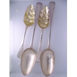 GEORGE III SILVER TABLESPOONS, TWO PAIRS, London hallmarks to include a pair of gilded bowl berry