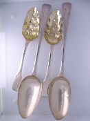 GEORGE III SILVER TABLESPOONS, TWO PAIRS, London hallmarks to include a pair of gilded bowl berry