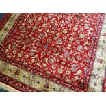 MODERN KASHMIR RUG, artificial silk, allover red scrolling palmette field, ivory palmette border and