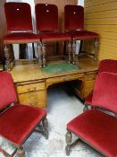 SET OF SIX ELIZABETHAN-STYLE OAK DINING CHAIRS & A VINTAGE MAHOGANY DESK (7) *sold on behalf of