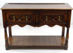 CHARLES II-STYLE OAK DRESSER BASE, moulded top above geometric frieze drawers, turned front