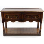 CHARLES II-STYLE OAK DRESSER BASE, moulded top above geometric frieze drawers, turned front