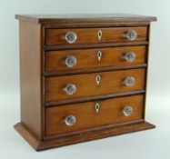 EDWARDIAN MINIATURE PINE MARQUETRY CHEST OF DRAWERS, fitted four drawers with glass handles and par