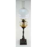 VICTORIAN GILT BRONZE OIL LAMP, cast two-part acanthus columns supporting slice-cut glass