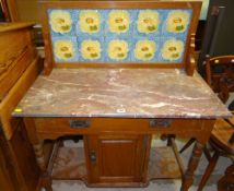 VICTORIAN WALNUT WASH STAND with later pottery tiled back and red veined marble top