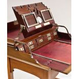 FINE EDWARDIAN MAHOGANY 'CAMPAIGN-TRAVEL' DESK, c.1910, plain hinged top opening to reveal a
