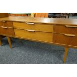 MID-CENTURY TEAK AUSTINSUITE SIDEBOARD, fitted six drawers, gilt stamp inside, 159 x 43 x 69cms (