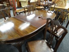 GEORGIAN-STYLE MAHOGANY DINING SUITE, comprising sideboard with Morgan retailer's label, extending