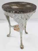 ANTIQUE CAST IRON GARDEN TABLE, with marble top (weathered), 59cms diam.