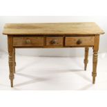 VICTORIAN PINE KITCHEN TABLE, fitted three frieze drawers on turned legs, 135cms wide