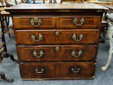 MID-18TH CENTURY WALNUT & FEATHERBANDED FIVE-DRAWER CHEST, fitted with oval escutcheons, and