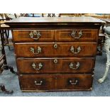 MID-18TH CENTURY WALNUT & FEATHERBANDED FIVE-DRAWER CHEST, fitted with oval escutcheons, and